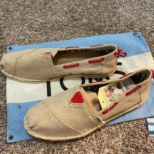 Brand new canvas TOMS shoes - Size 9.